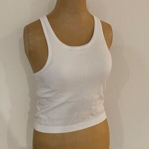 Lululemon sz 6 Ebb To Street Tank II
White Ribbed Tank Top bra like new cond